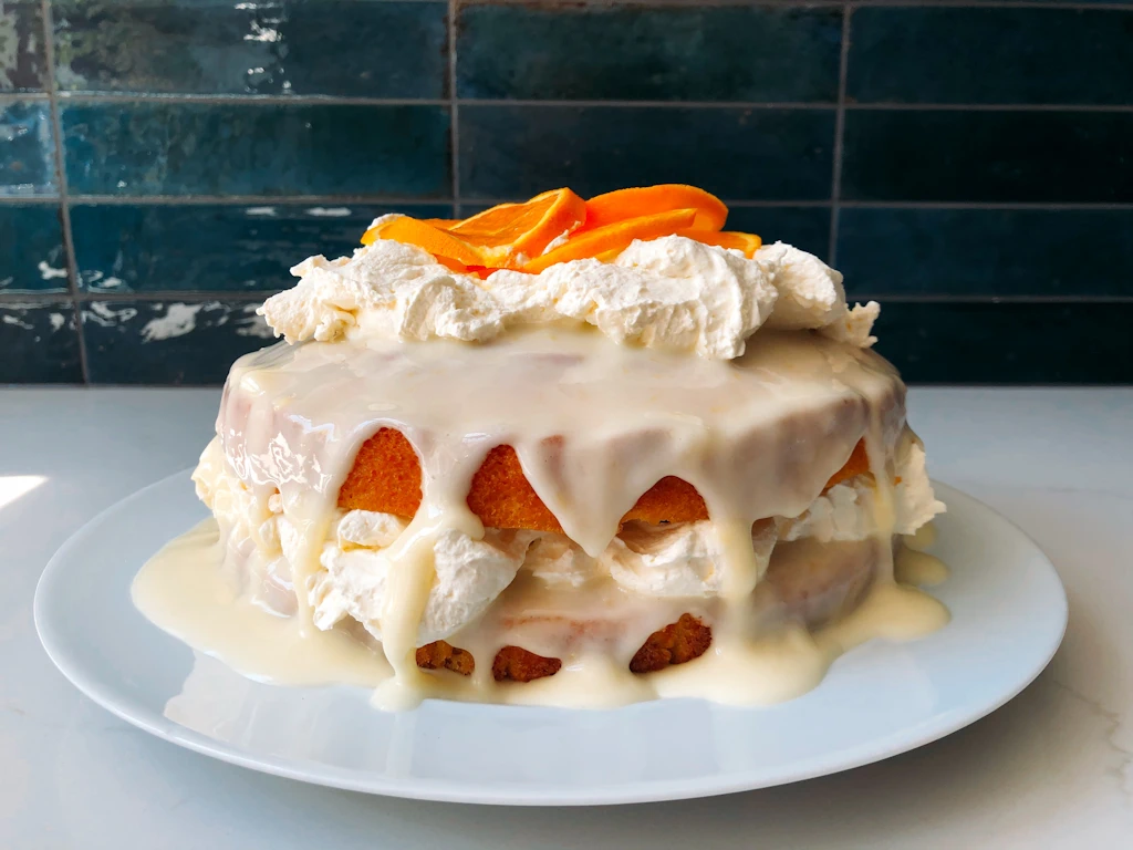 Citrus cake with cream filling on a plate