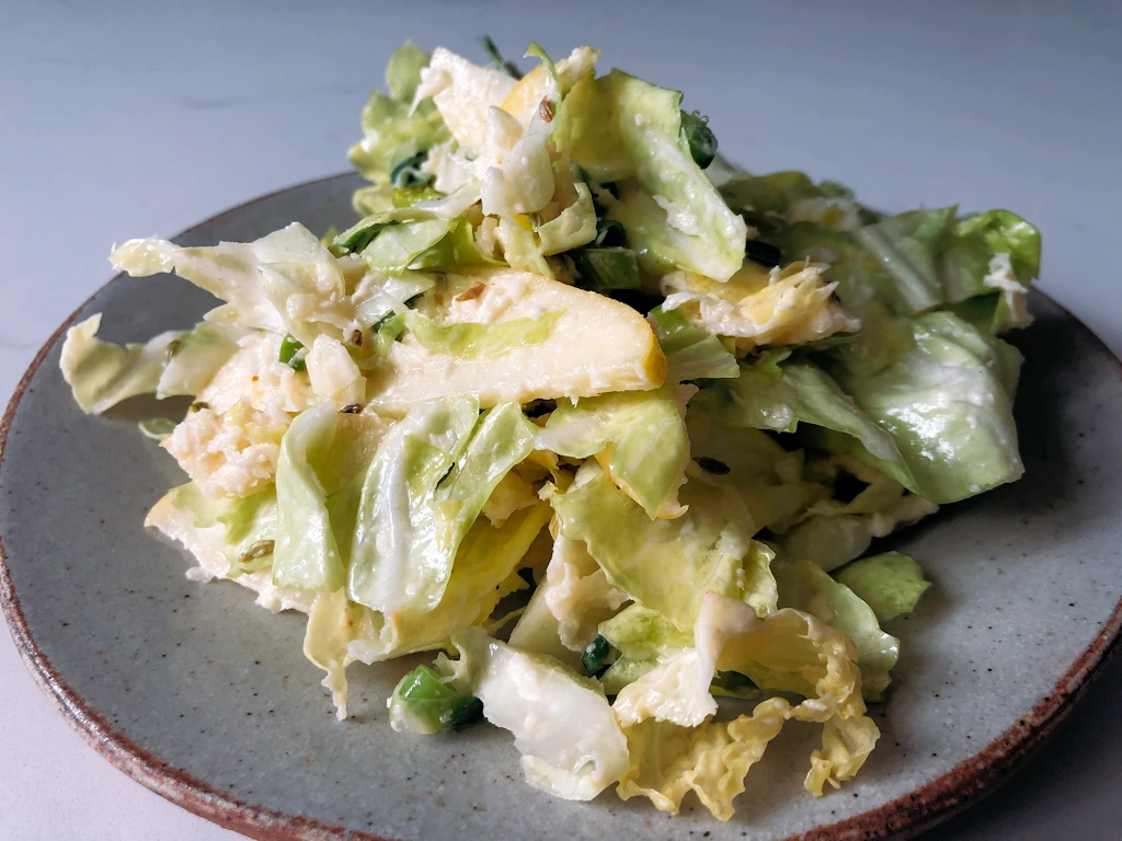 Recipe for horseradish kohlrabi slaw on a plate